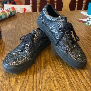 Vans black with silver shoes. Old skool style.